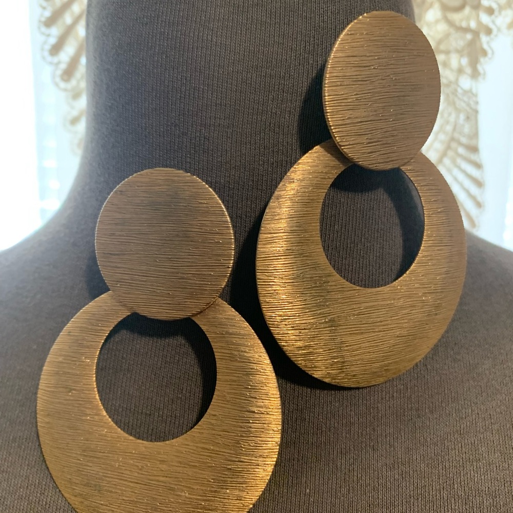 Gold tone pierced earrings